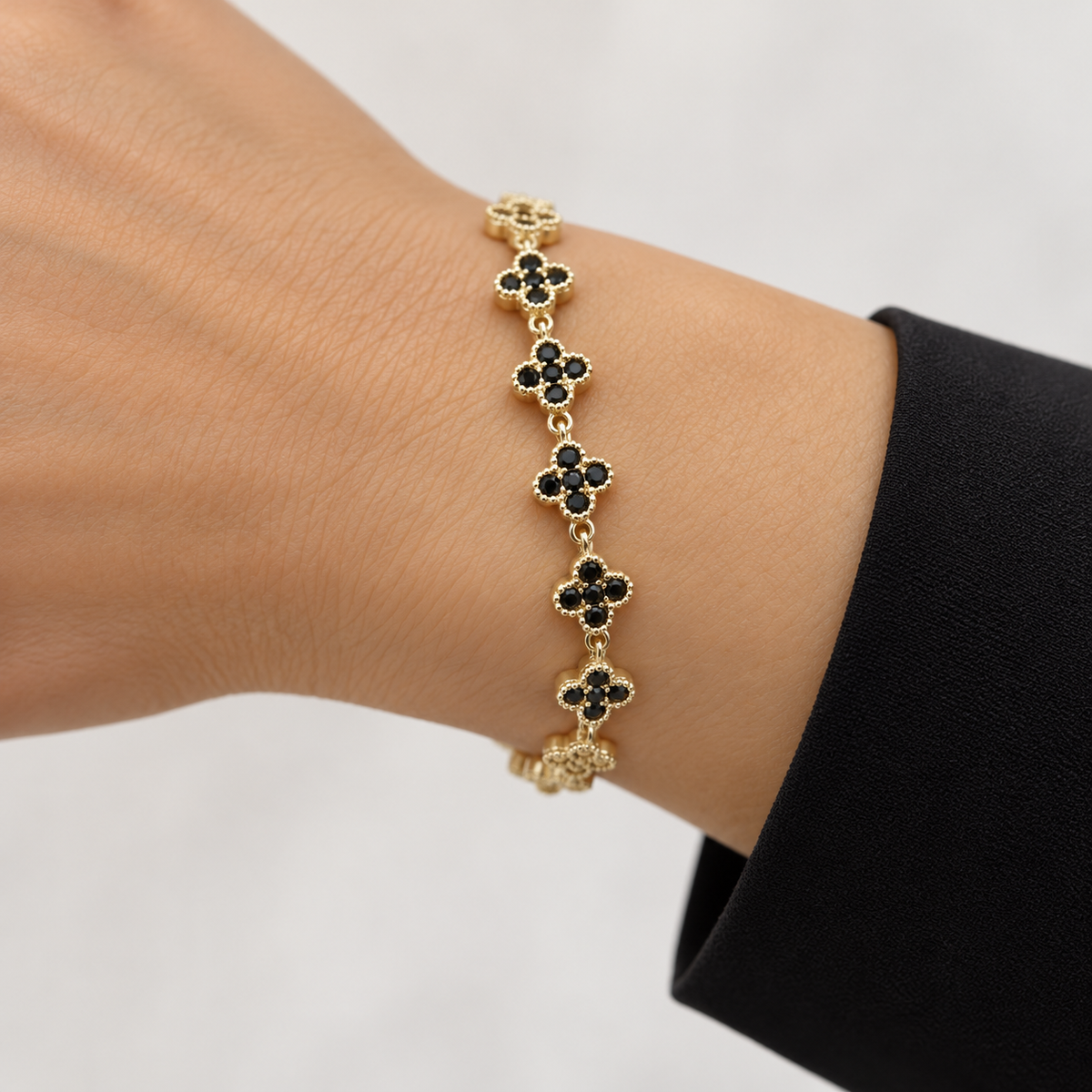 Clover and CZ Bracelet — black realistic wrist try-on