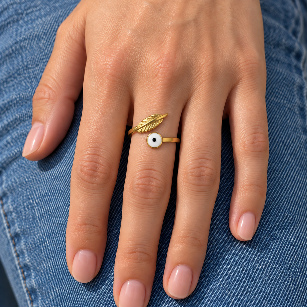 Arielle Evil Eye Ring try-on on denim with correct leaf orientation