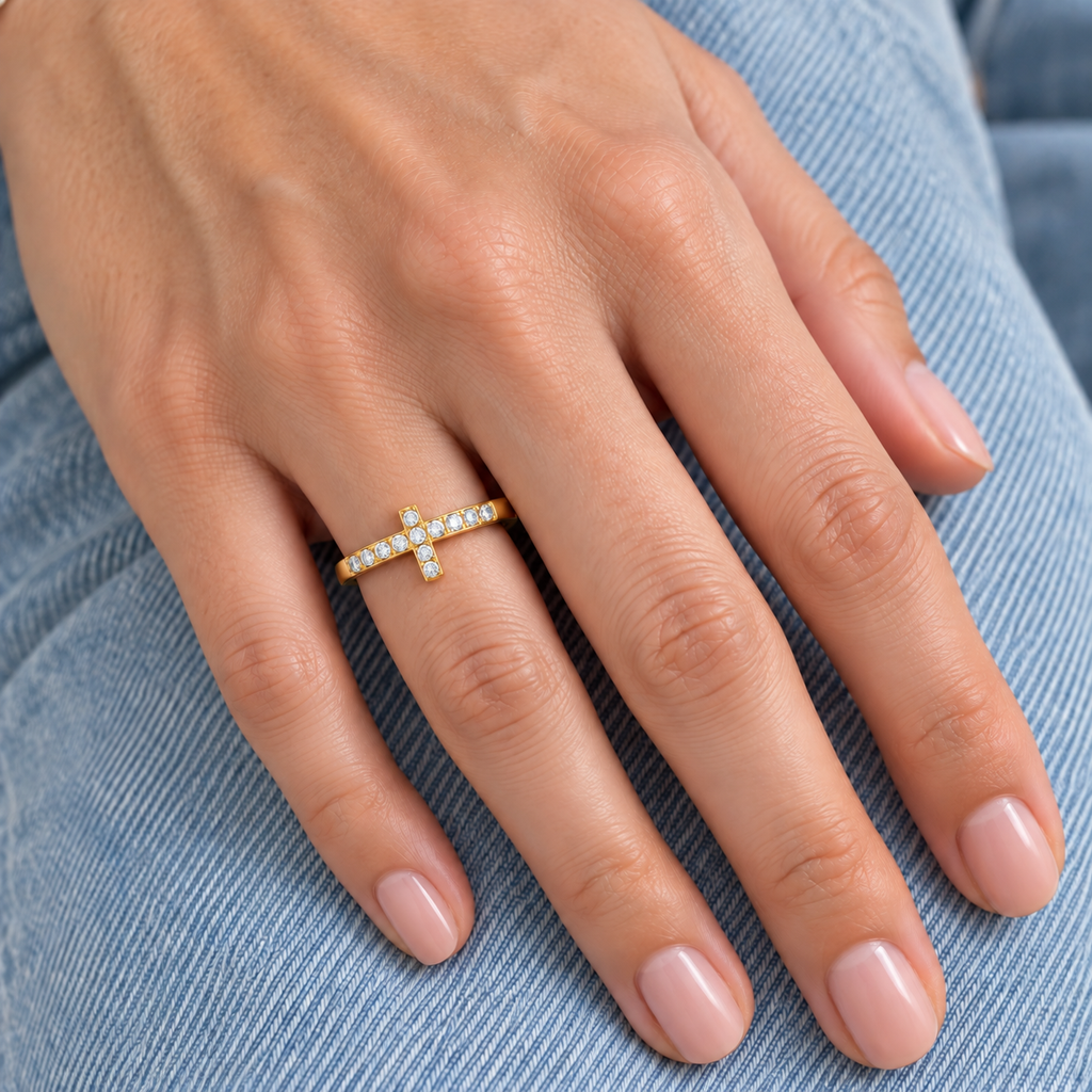 Belle Cross Ring virtual try-on worn alone, yellow gold band with clear stones and a delicate cross