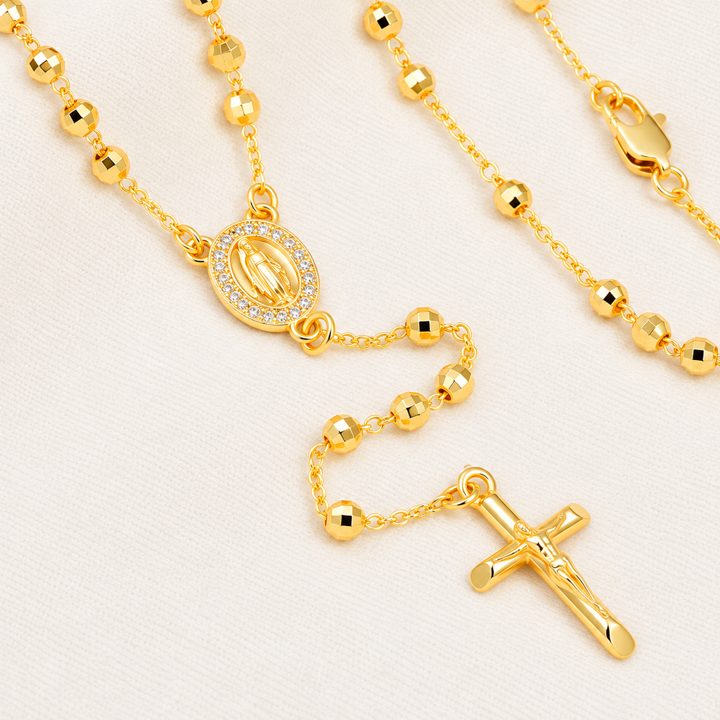 Clara Classic Gold-Plated Rosary close-up – faceted beads and religious medal