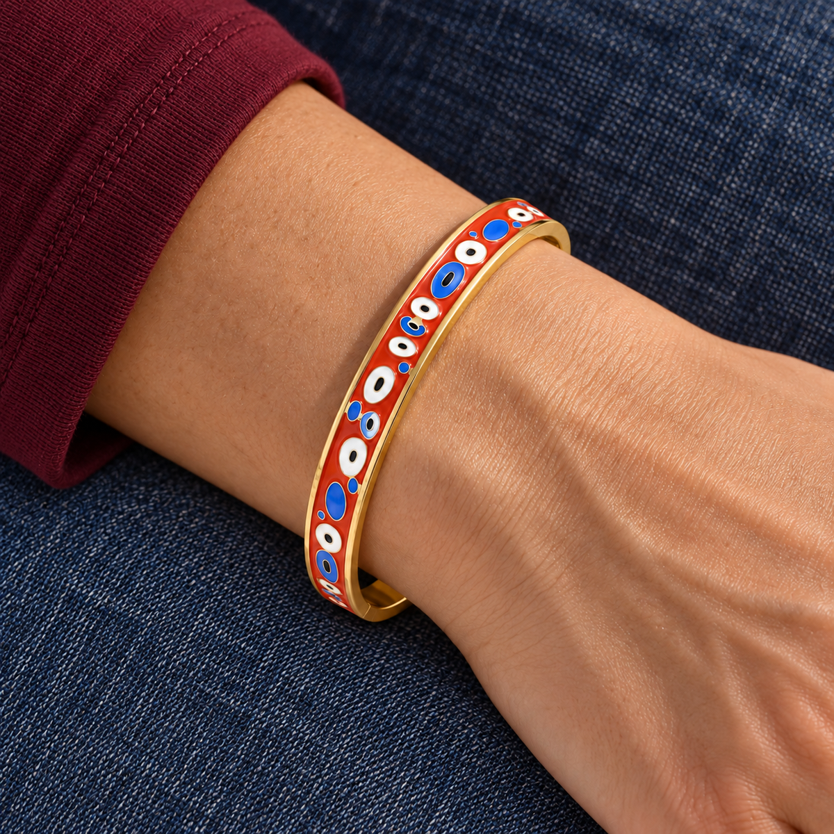Clara Evil Eye Bracelet worn on wrist with modern everyday clothing
