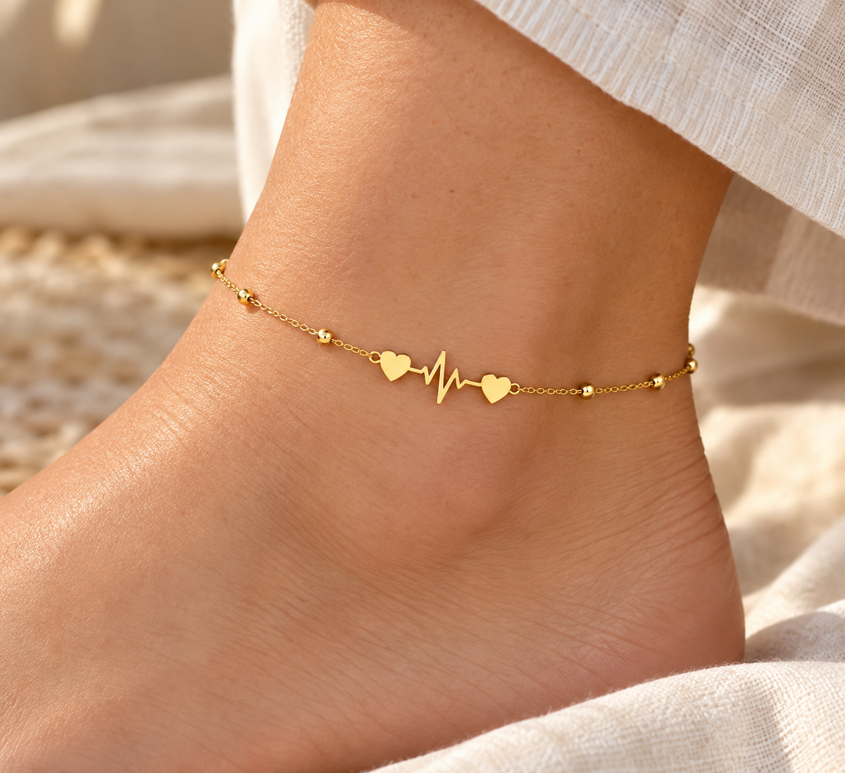 Elara Heart Anklet worn on ankle