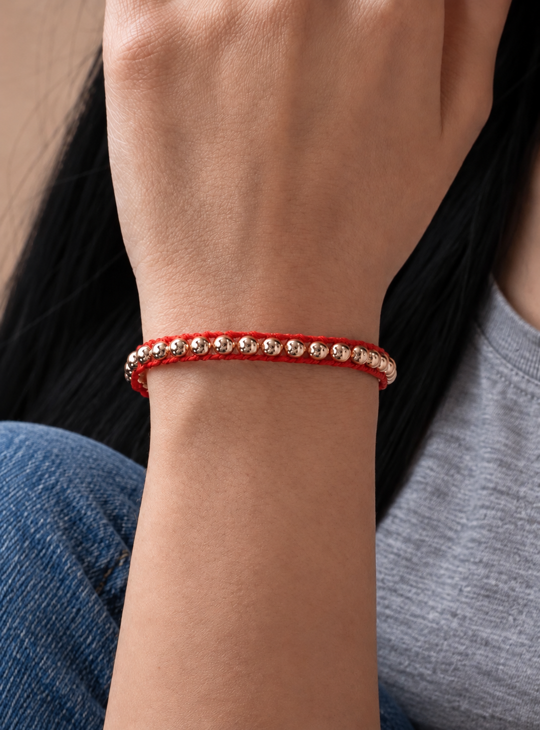 Fortuna Beaded Cord Bracelet worn with casual everyday clothing