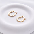 Twisted Mini Huggie Hoops