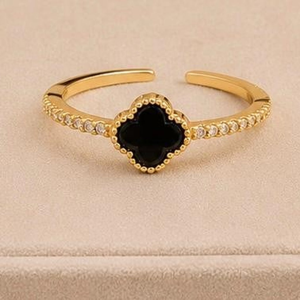 Black Clover Adjustable Ring – Gold Plated – close up on display