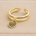Black Heart Charm Adjustable Ring – Gold Plated – close up on display