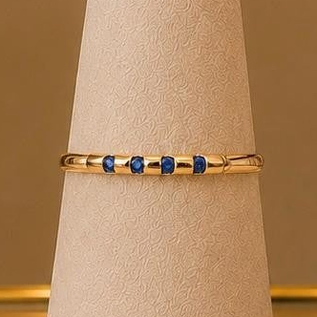 Blue Stone Adjustable Ring – Gold Plated – close up on display