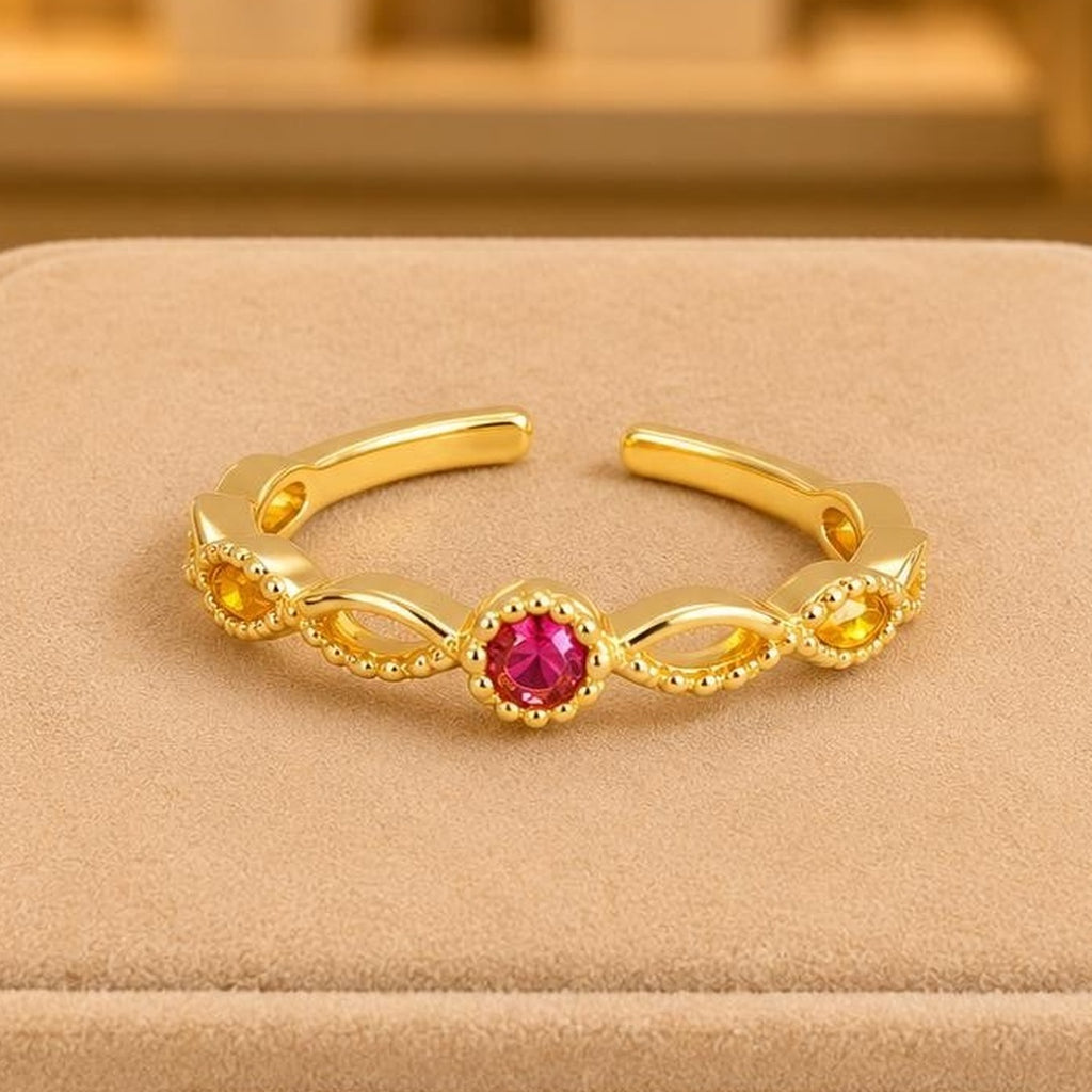 Fuchsia Infinity Adjustable Ring – Gold Plated – close up on display