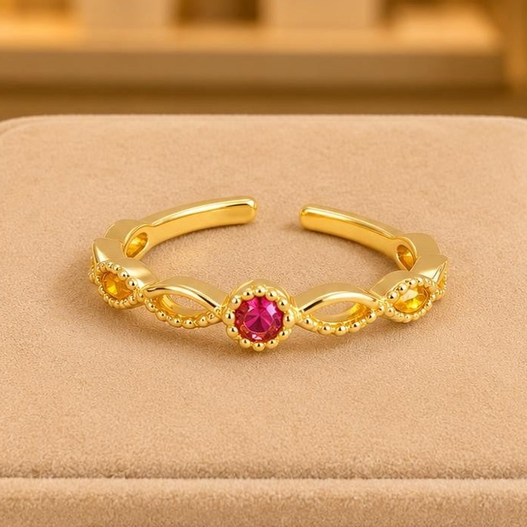 Fuchsia Infinity Adjustable Ring – Gold Plated – close up on display