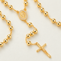 Grace Bold Gold-Plated Rosary — close-up of 6 mm beads, Virgin Mary medal and crucifix