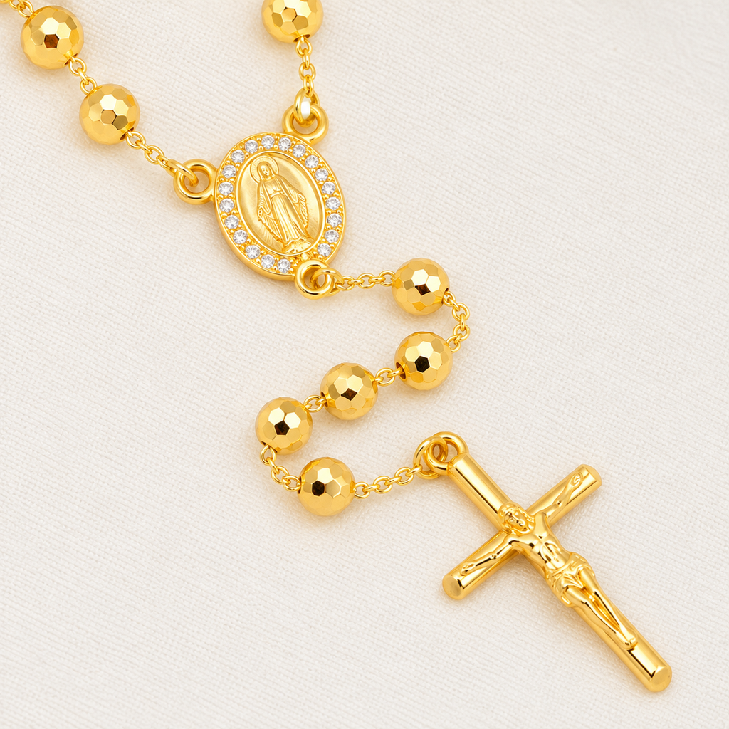Clara Grande Gold-Plated Rosary — close-up of beads, Virgin Mary medal and crucifix