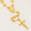 Clara Grande Gold-Plated Rosary — close-up of beads, Virgin Mary medal and crucifix