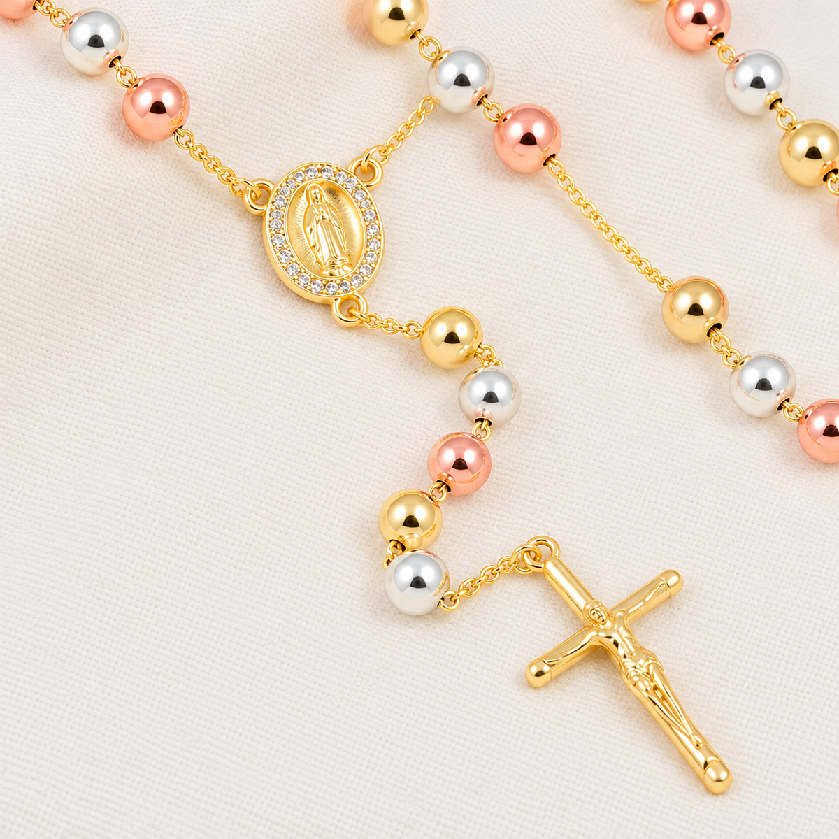 Faith Bold Tri-Tone Rosary — close-up of beads, Virgin Mary medal and crucifix