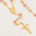 Serena Bold Tri-Tone Rosary — close-up of beads, Virgin Mary medal and crucifix