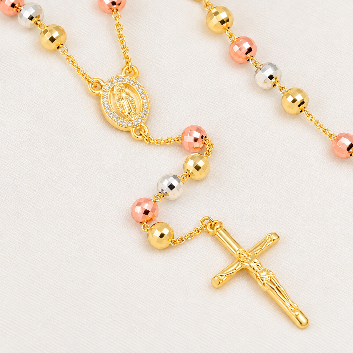 Serena Bold Tri-Tone Rosary — close-up of beads, Virgin Mary medal and crucifix