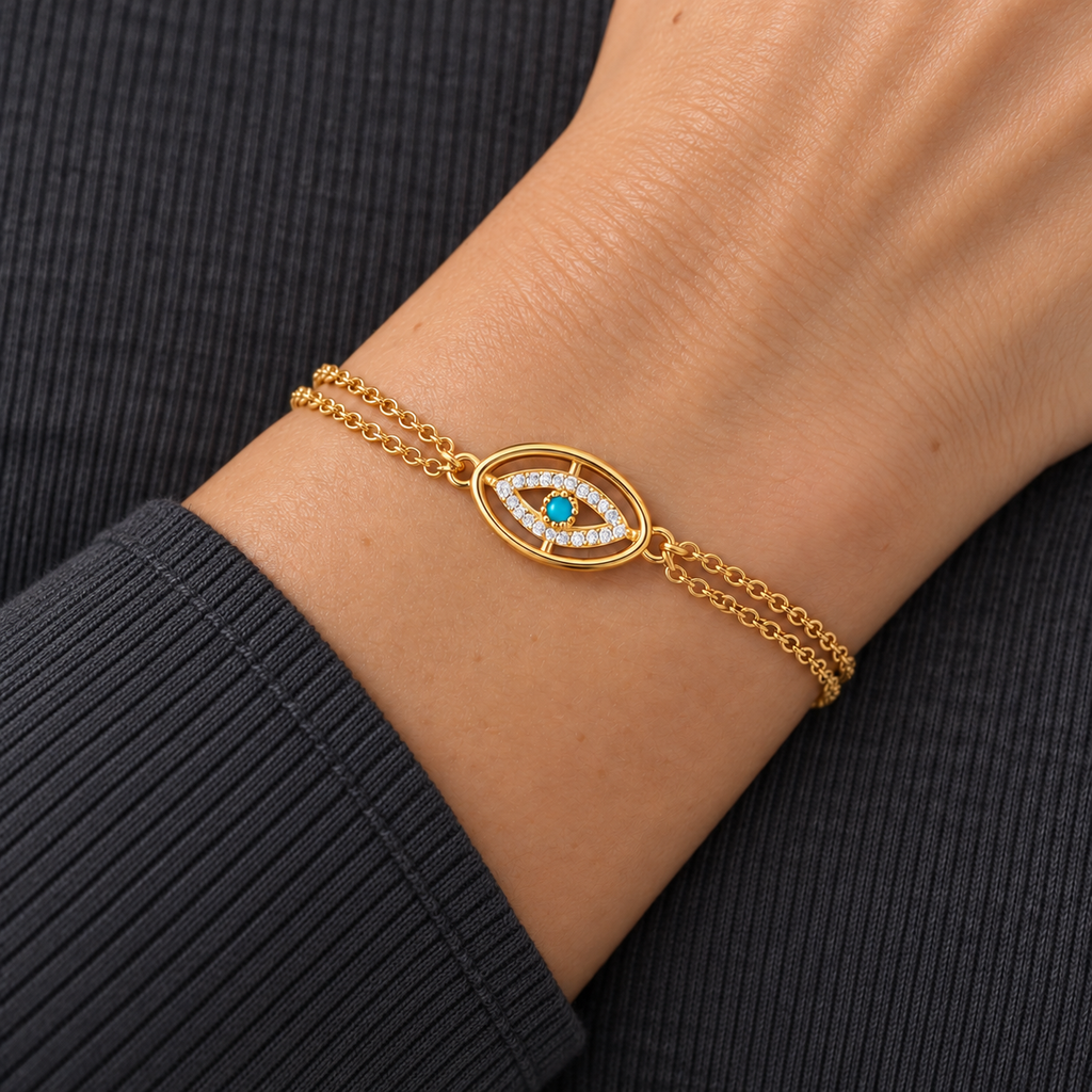 Lumi Evil Eye Bracelet worn on wrist with modern everyday clothing