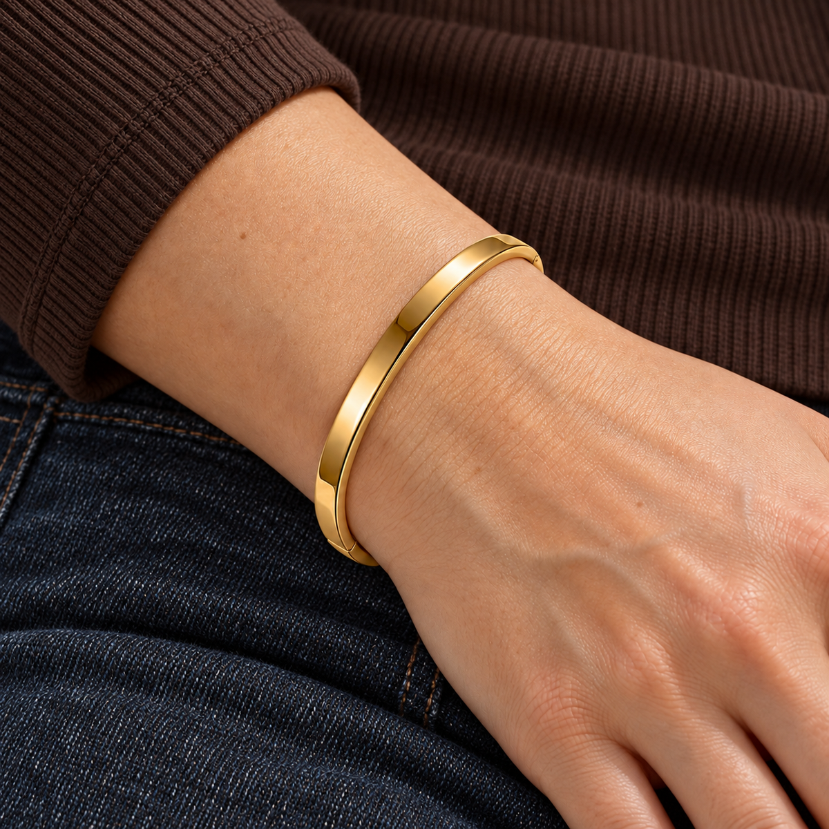Nova Engravable Bracelet worn on wrist with modern everyday clothing