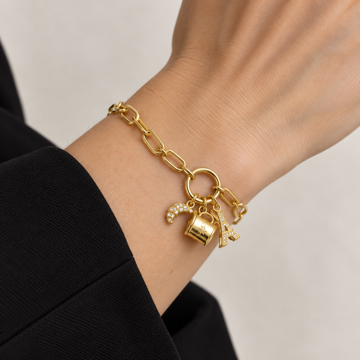 Paris Charm Paperclip Bracelet — worn on wrist