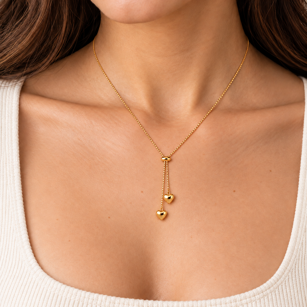 Siena Heart Necklace close-up try-on with delicate proportions, small puffy hearts, box chain and oval slider