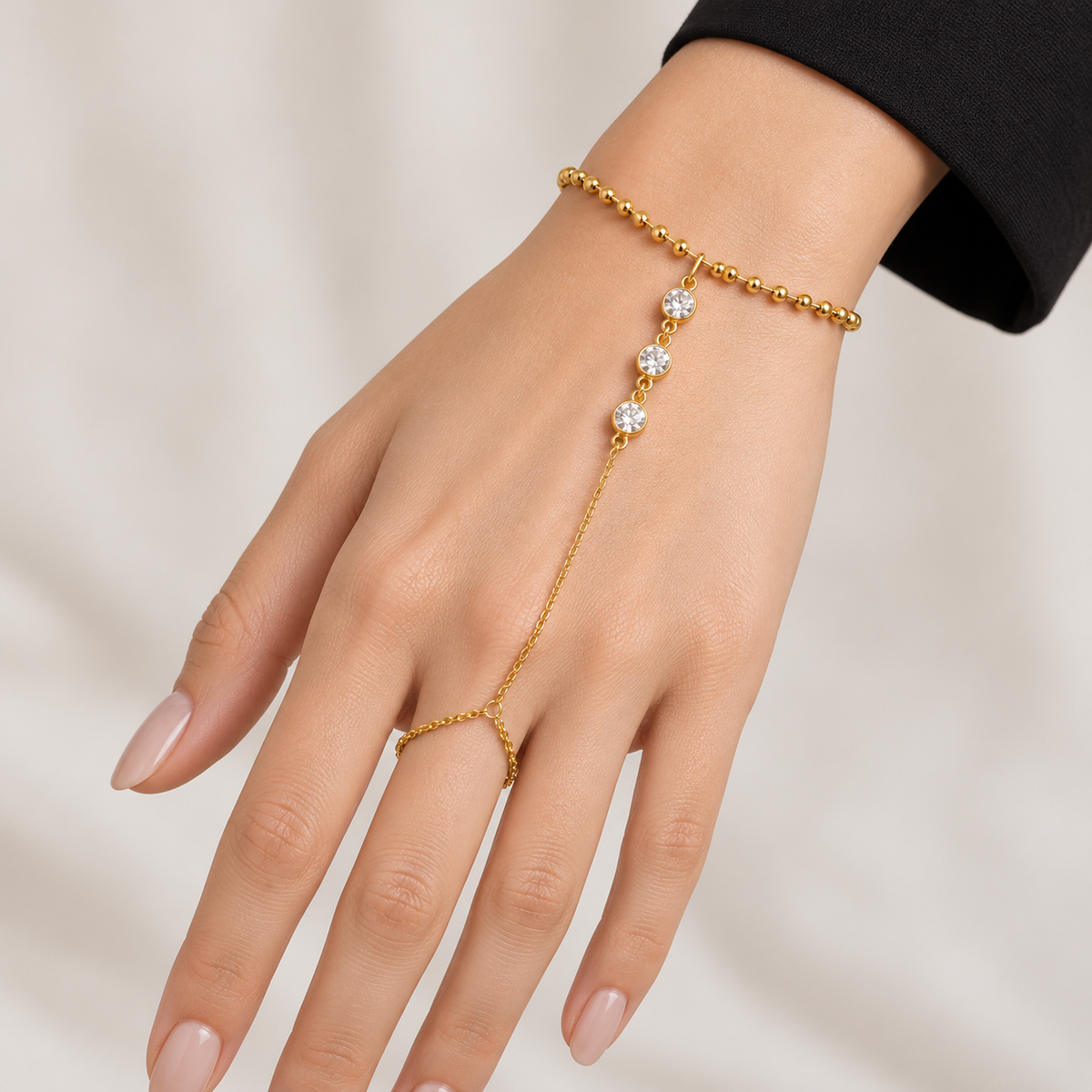 Three-Stone CZ Hand Chain Bracelet — bracelet worn on wrist